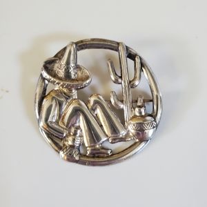 Small silver vintage pin